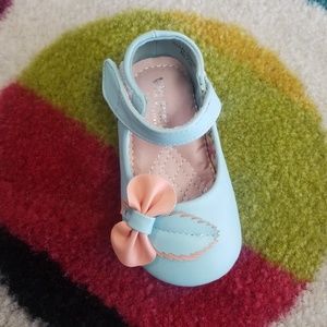 Little girls blue and coral shoes